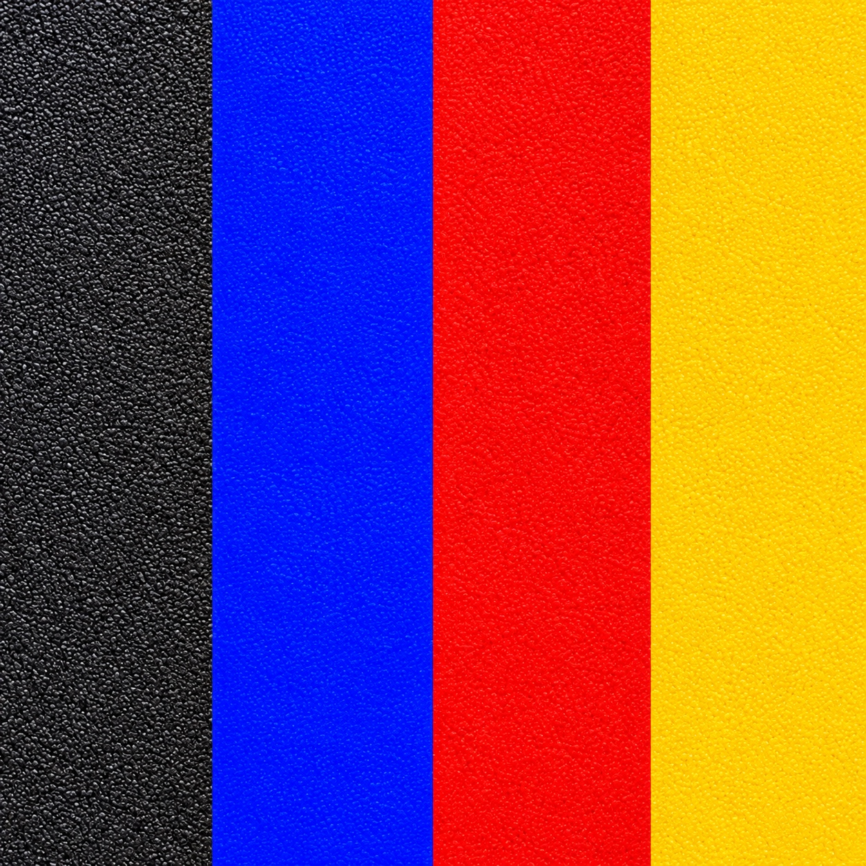 Close-up of textured black, blue, red and yellow puckboard surfaces